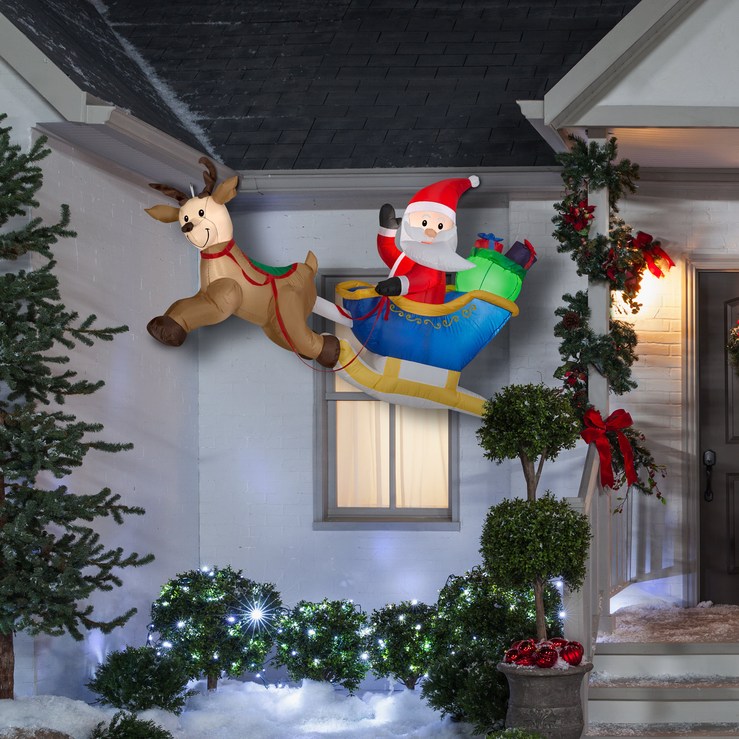 The Holiday Aisle Flying Santa And Reindeer Lighted Display