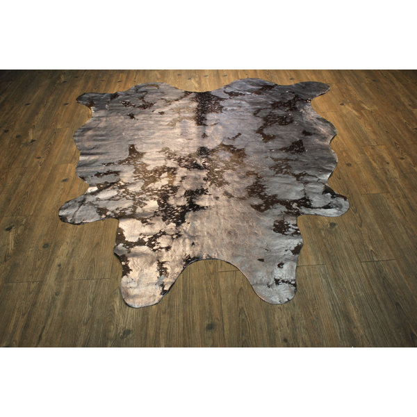 Augustine Hand Woven Cowhide Metallic Silver/Black Area Rug by Bloomsbury Market