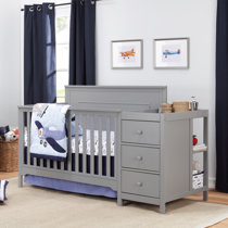 gray crib and changing table