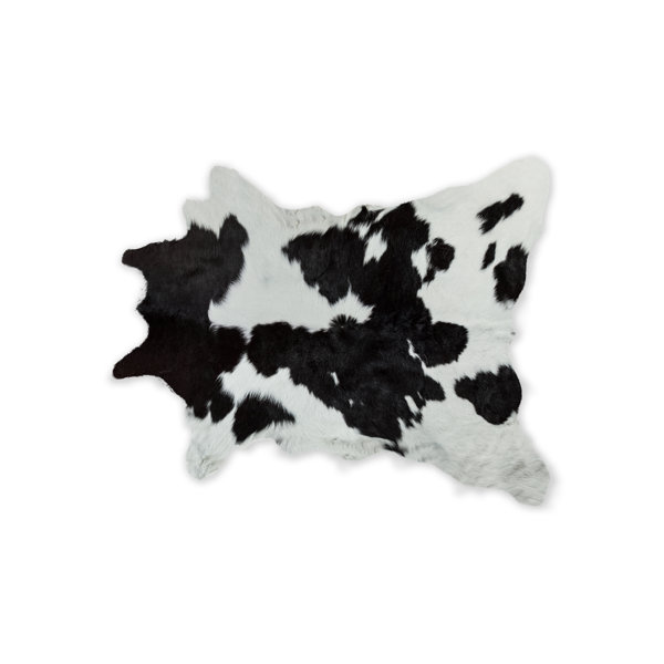 Hafsa Hand-Woven Cowhide Black/White Area Rug by Bloomsbury Market